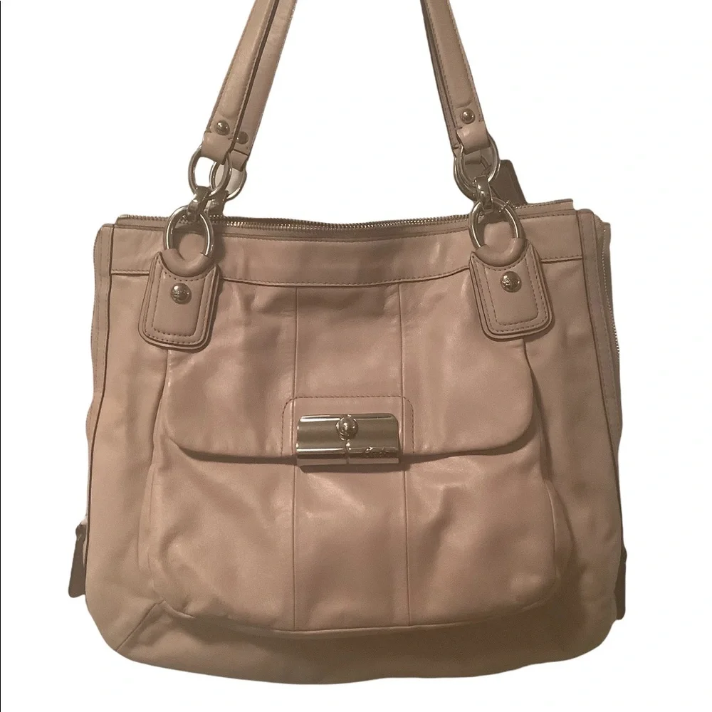 Light dusty pink coach purse